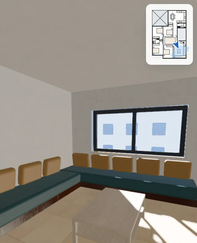 Inside the example home at eye level: the living room with its sofa and chairs, and a small map showing where you stand.